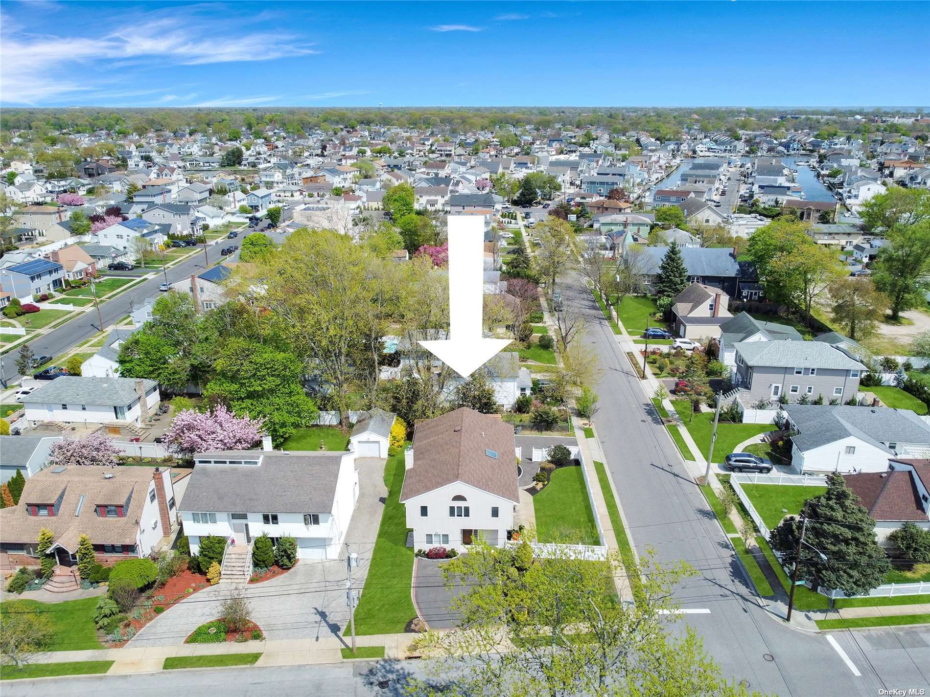 2651 Bedell Street Bellmore, NY 11710 - Photo 1 of 20 an aerial view of residential houses with outdoor space