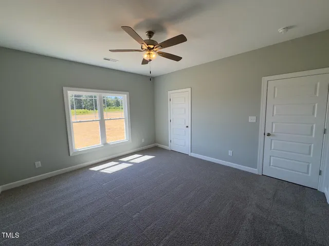 a bathroom with a sink and vanity