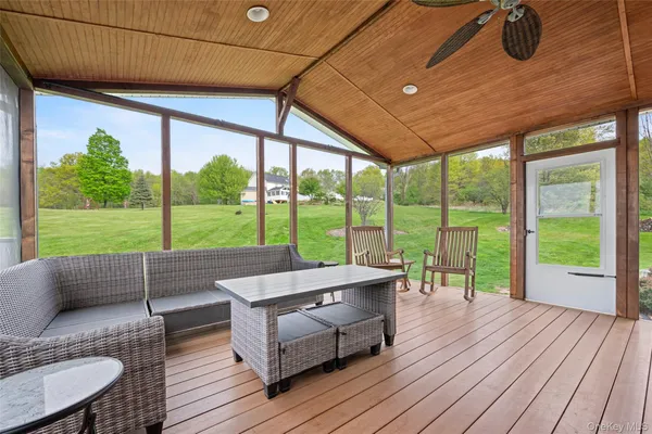a house view with a seating space and garden view