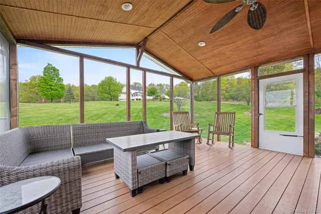 a house view with a seating space and garden view