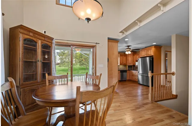 a view of a patio with table and chairs