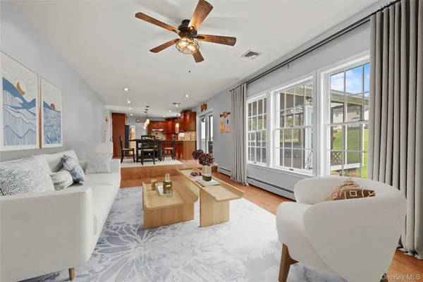 a kitchen with stainless steel appliances granite countertop a sink a stove and cabinets