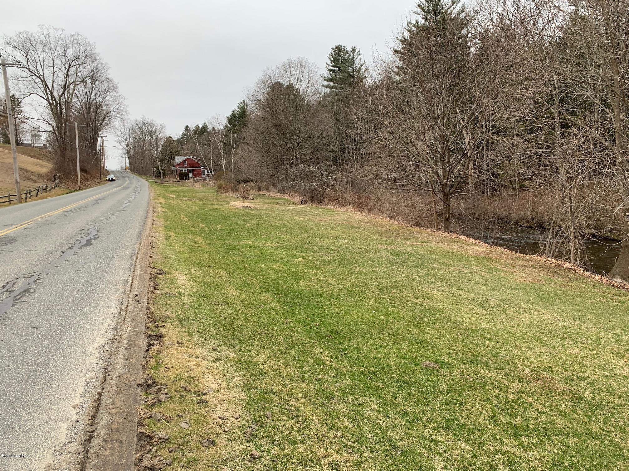 135 Main Road Tyringham, MA 01264 - Photo 7 of 8 a view of a yard with trees