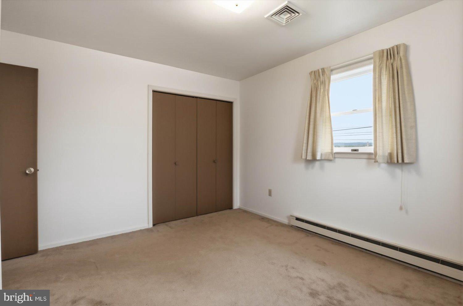 107 North Line Road Stevens, PA 17578 - Photo 15 of 26 an empty room with windows
