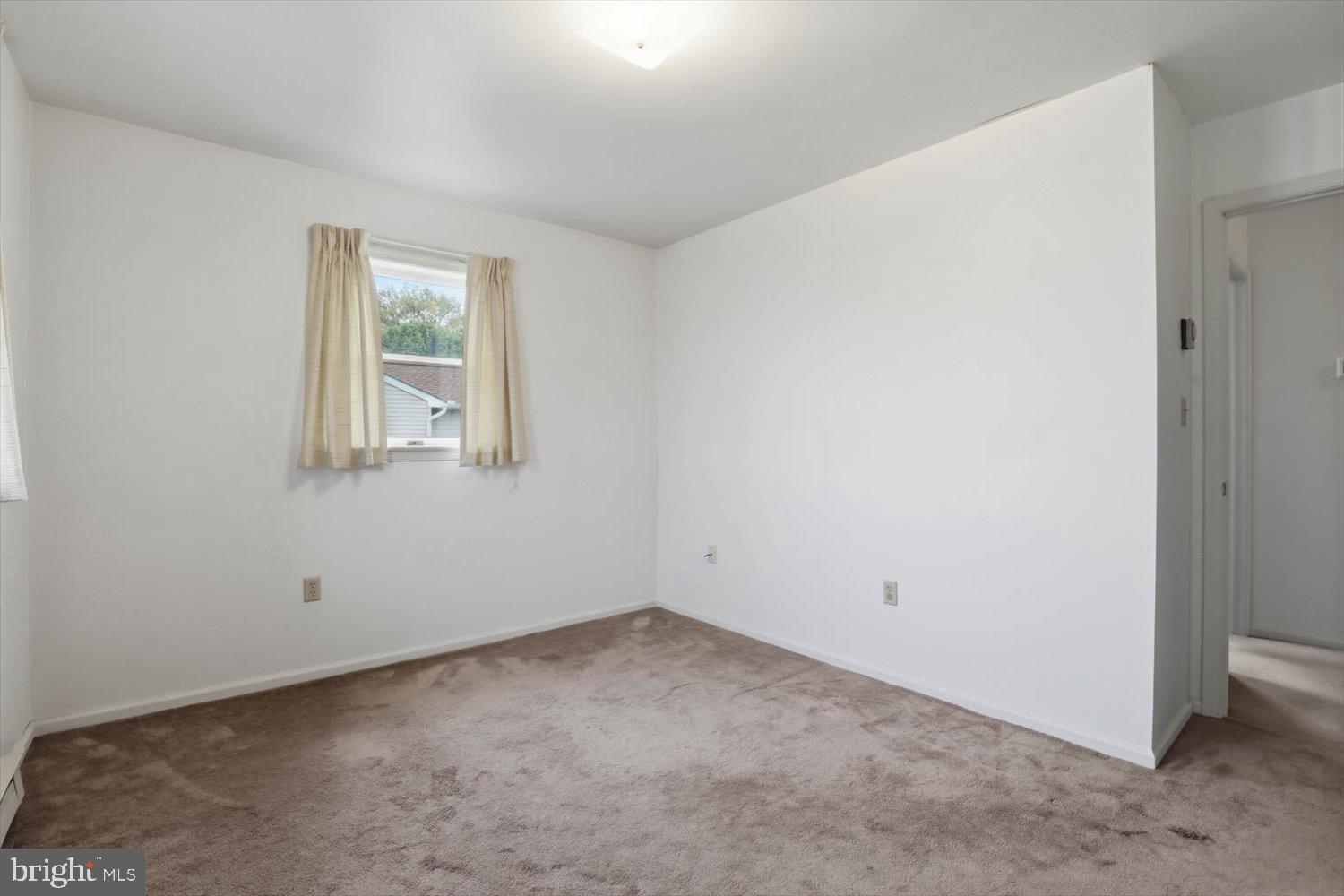 107 North Line Road Stevens, PA 17578 - Photo 16 of 26 an empty room with a window