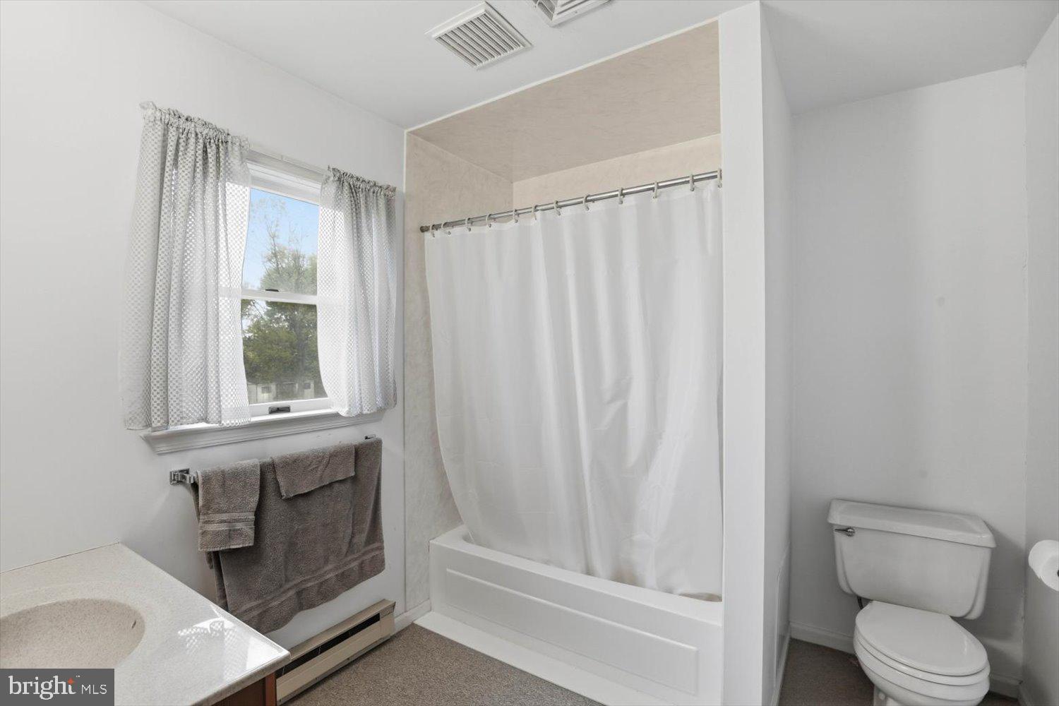 107 North Line Road Stevens, PA 17578 - Photo 20 of 26 a bathroom with a toilet and a sink