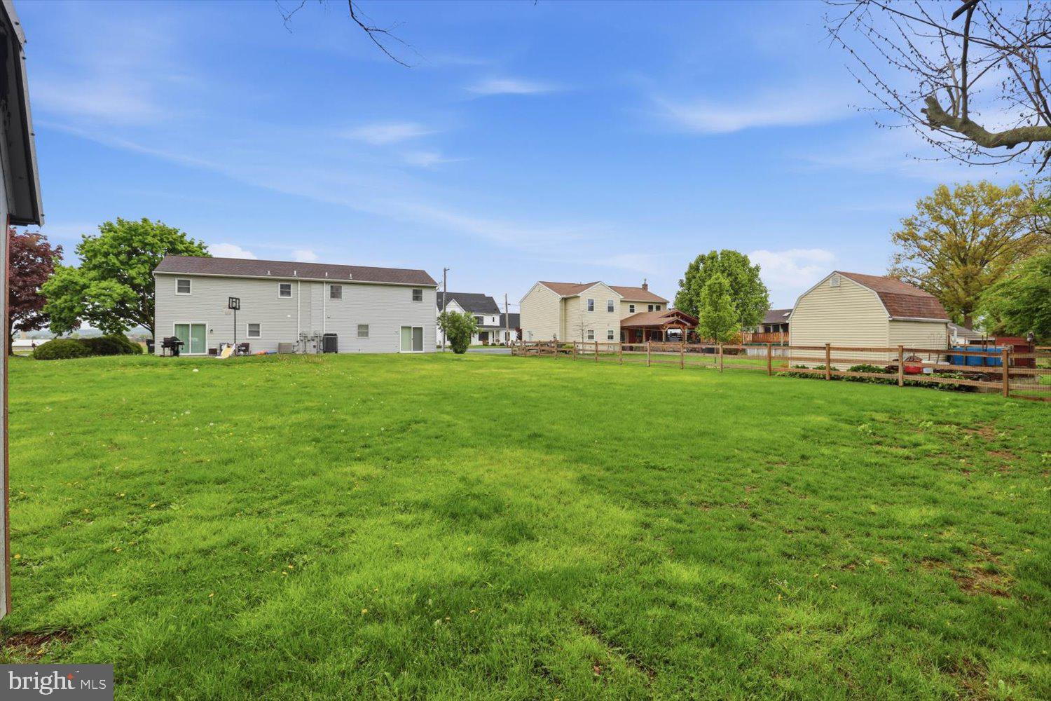 107 North Line Road Stevens, PA 17578 - Photo 24 of 26 a view of a house with backyard and garden