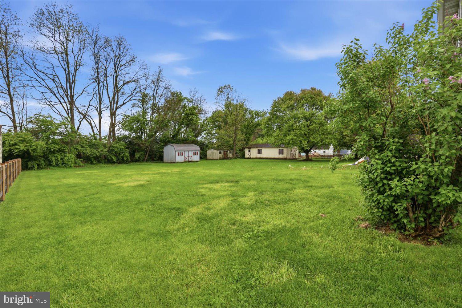 107 North Line Road Stevens, PA 17578 - Photo 25 of 26 a view of a grassy field with trees in the background
