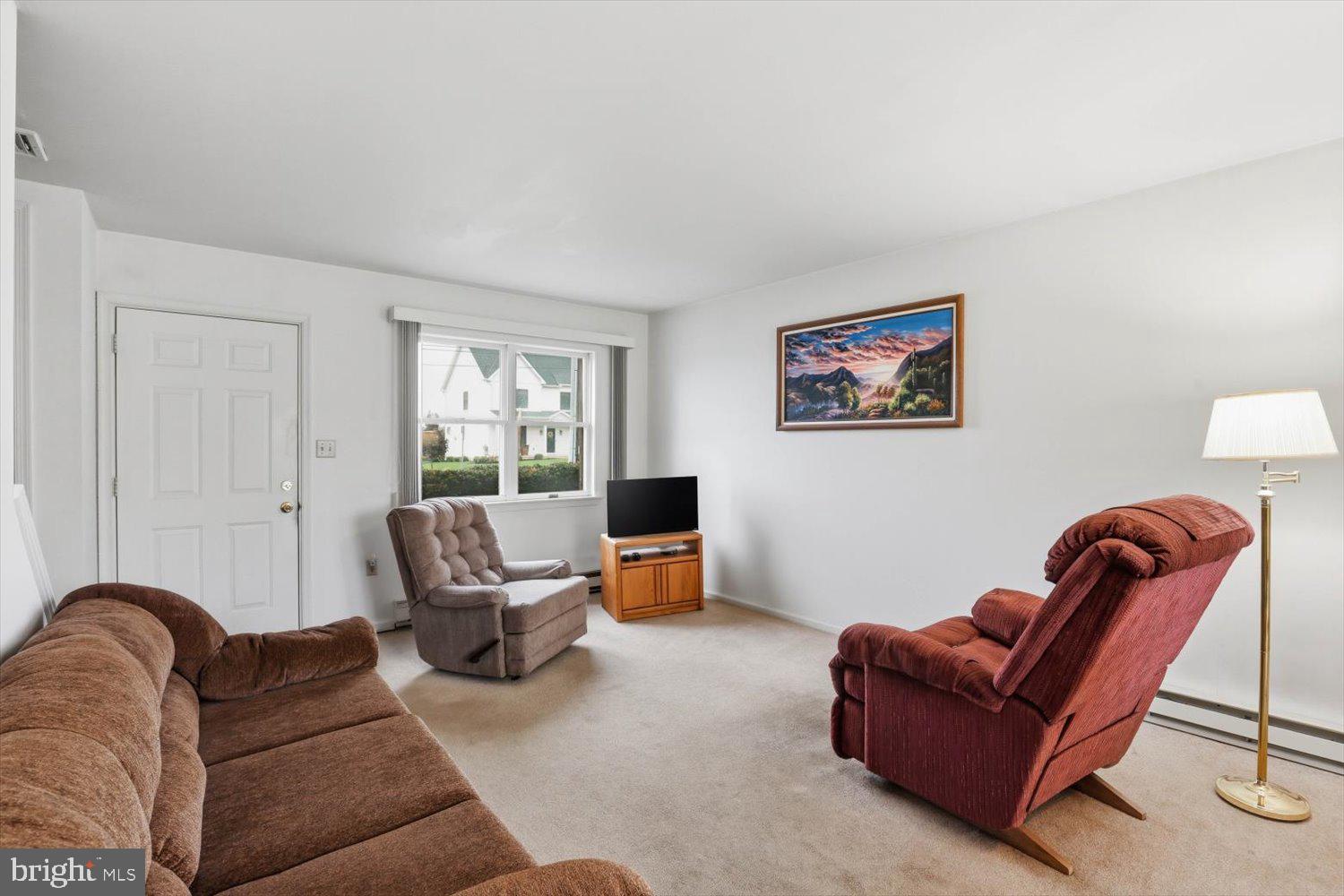 107 North Line Road Stevens, PA 17578 - Photo 3 of 26 a living room with furniture