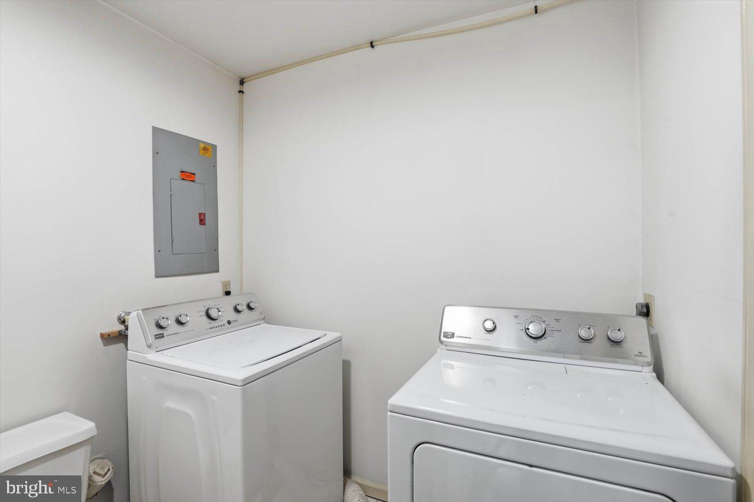 107 North Line Road Stevens, PA 17578 - Photo 9 of 26 a utility room with dryer and washer