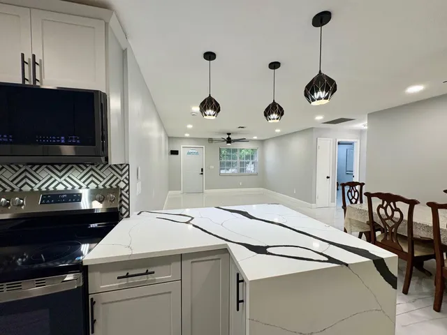 a very nice looking room with a flat screen tv