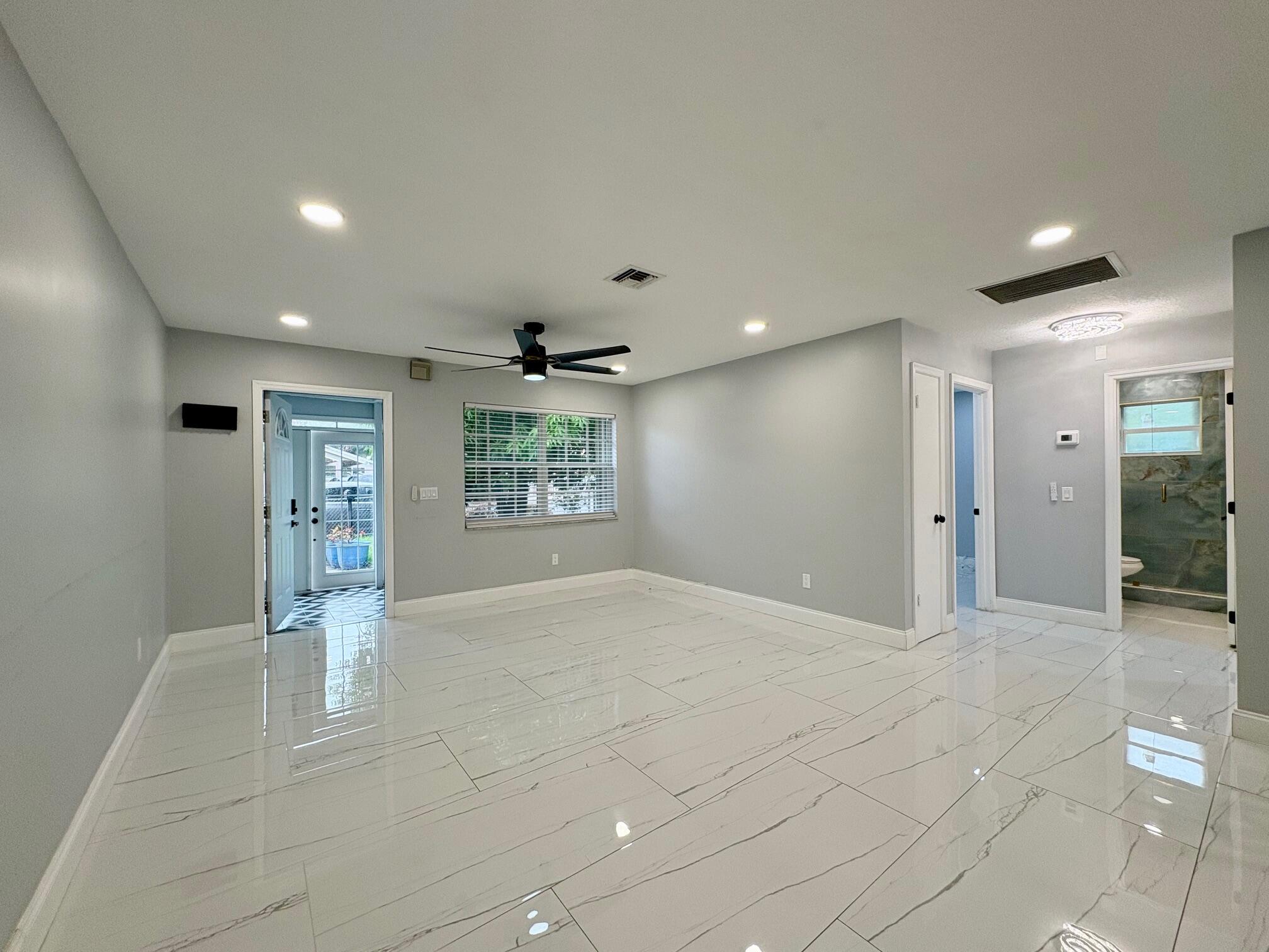 1733 Sunset Avenue Lake Worth Beach, FL 33460 - Photo 4 of 19 a view of an empty room