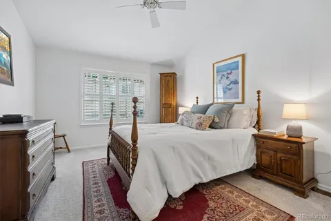 a bed room with a bed and a fish tank