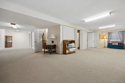 a view of a livingroom with furniture and furniture