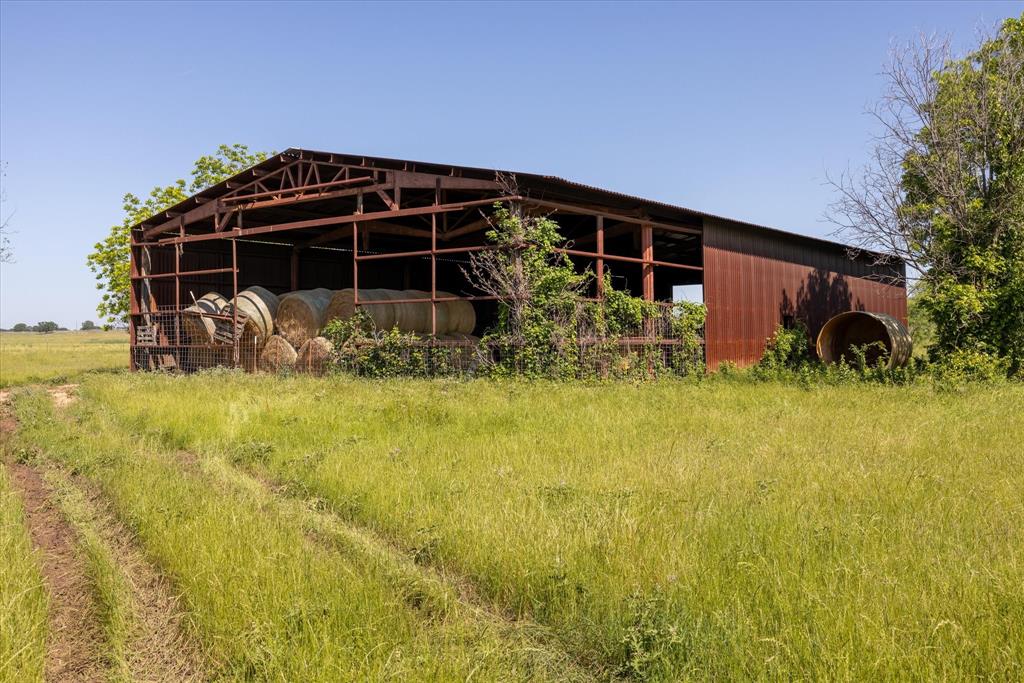 11701 Bowden Road Lipan, TX 76462 - Photo 10 of 26 a front view of a house with a yard