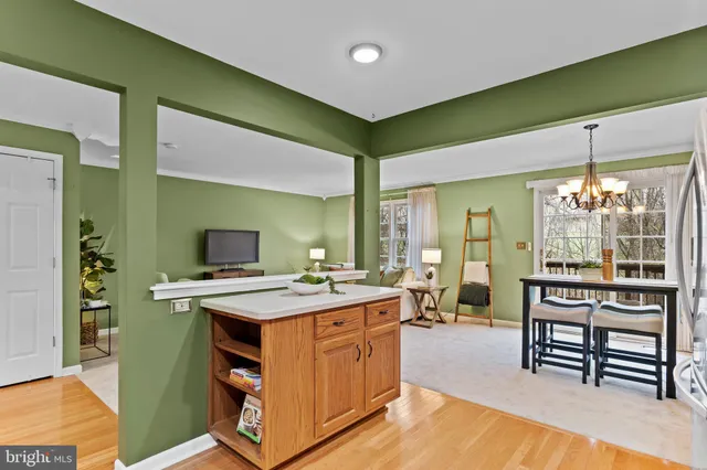 a kitchen with a stove and a table