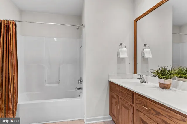 a bathroom with a sink and a bathtub