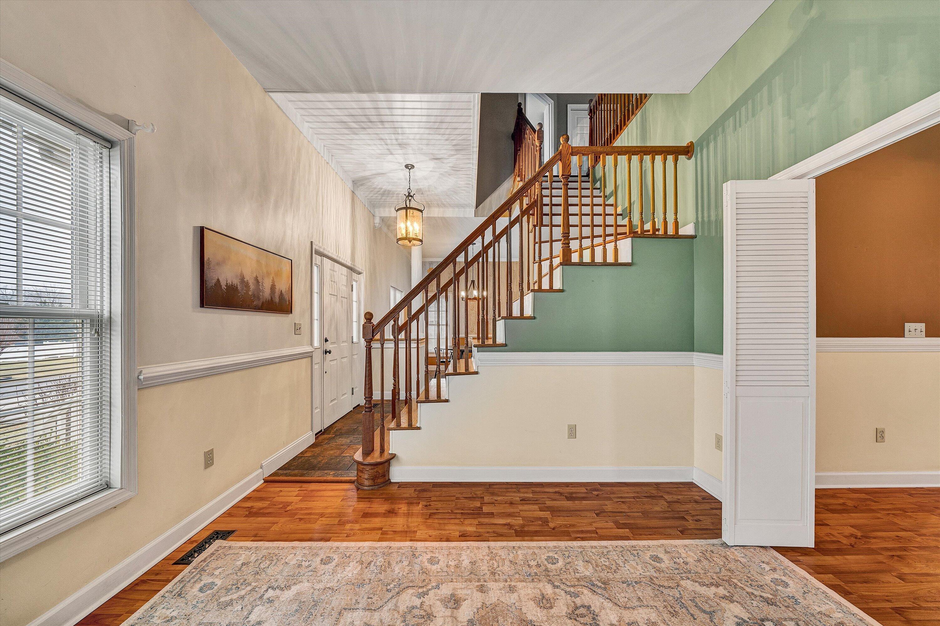 116 Dustys Road Covington, VA 24426 - Photo 14 of 96 a view of entryway and hall with wooden floor