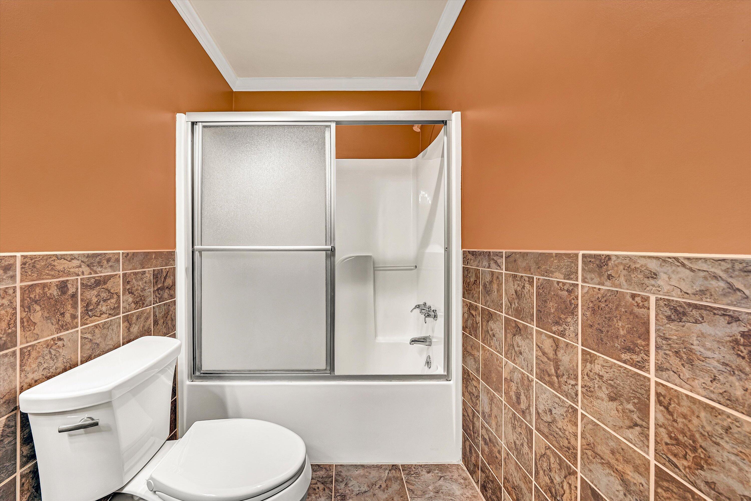 116 Dustys Road Covington, VA 24426 - Photo 62 of 96 a bathroom with a toilet and shower