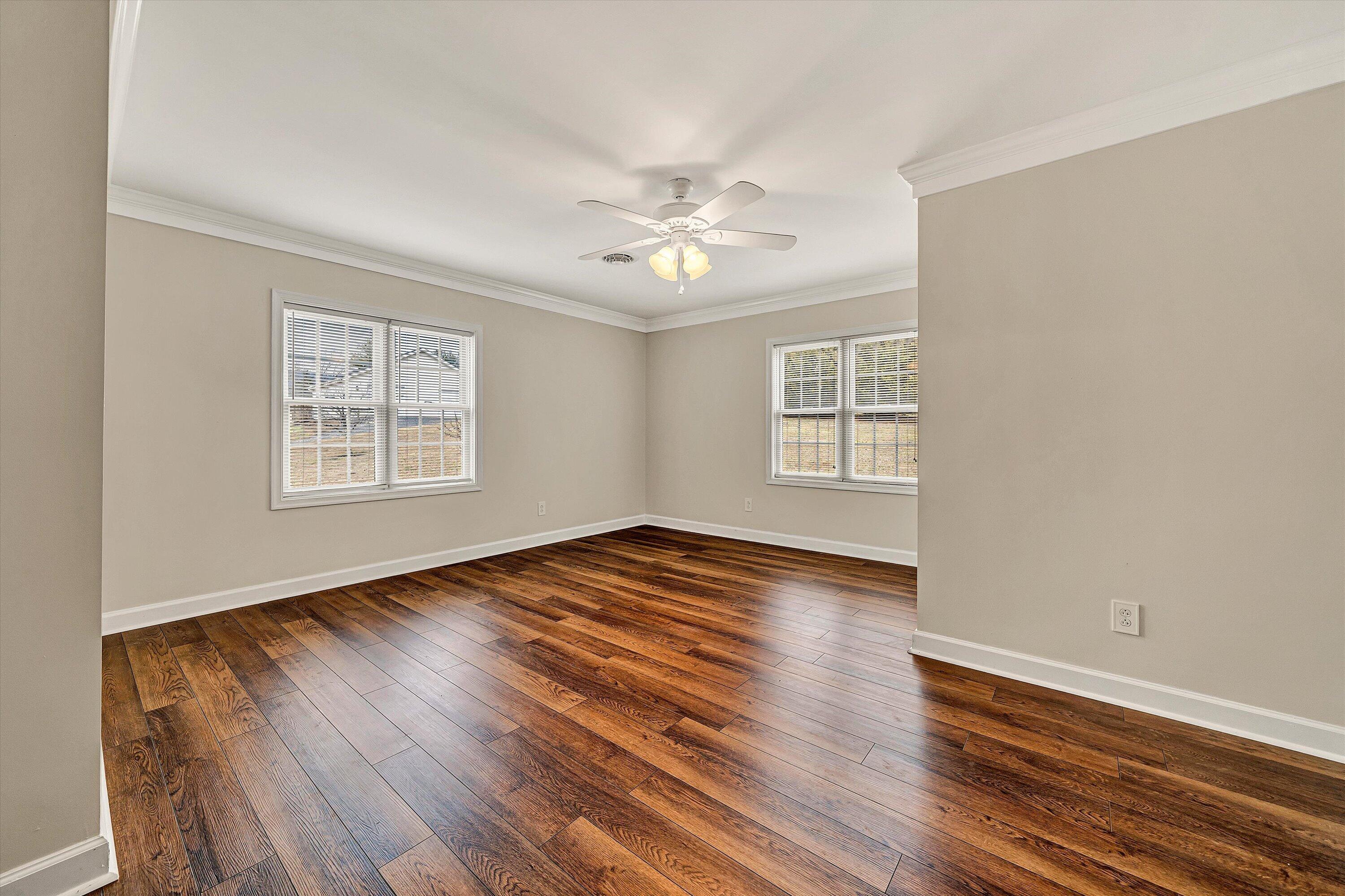 116 Dustys Road Covington, VA 24426 - Photo 73 of 96 a view of an empty room with wooden floor and a window