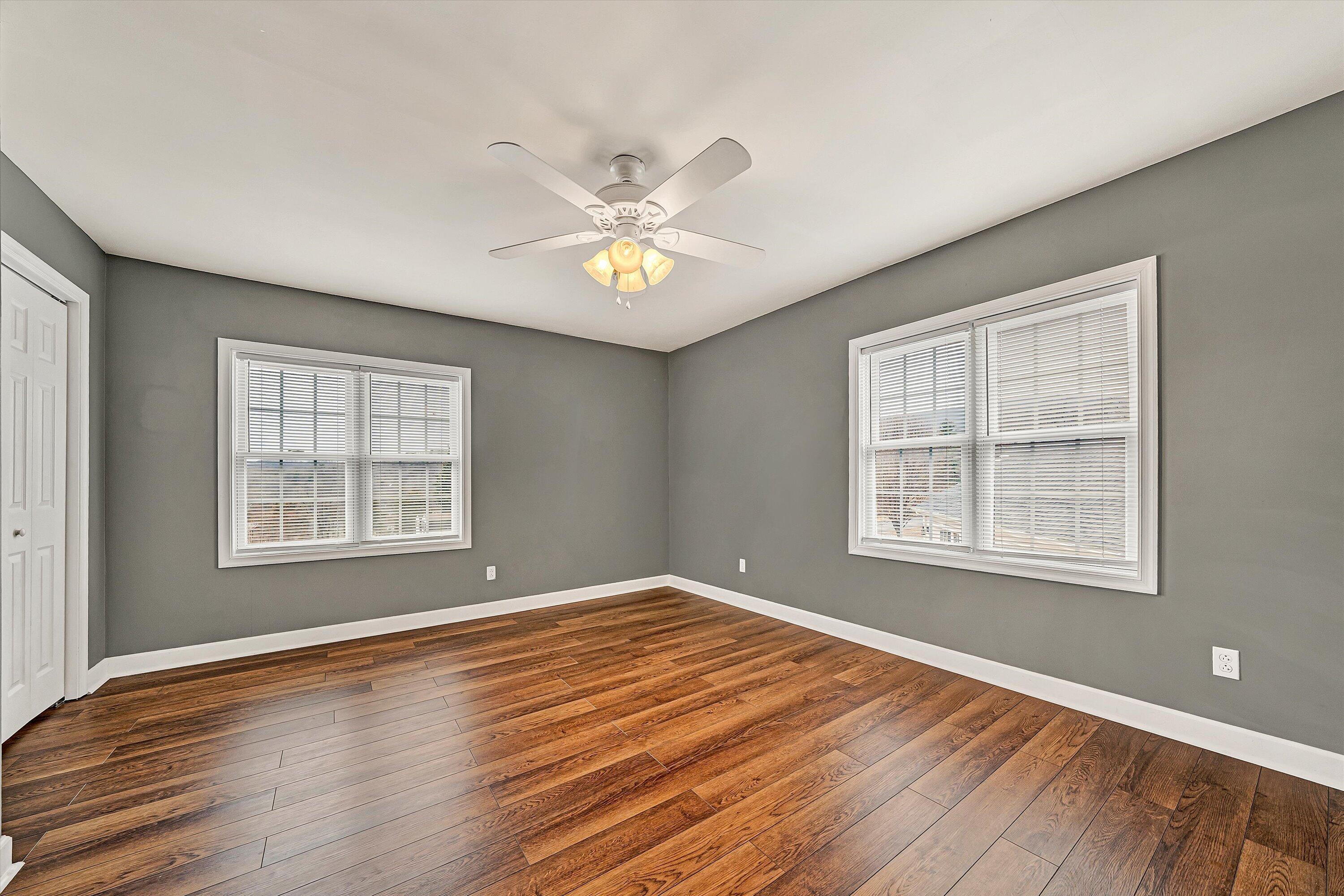 116 Dustys Road Covington, VA 24426 - Photo 76 of 96 a view of an empty room with a window and wooden floor