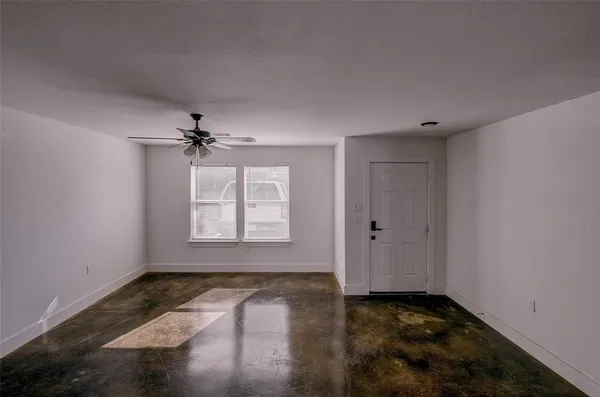 an empty room with windows
