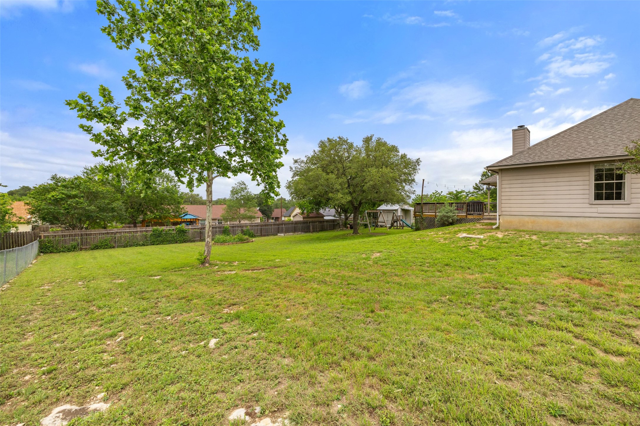 135 Barton Road San Marcos, TX 78666 - Photo 11 of 29 Spacious landscape backyard