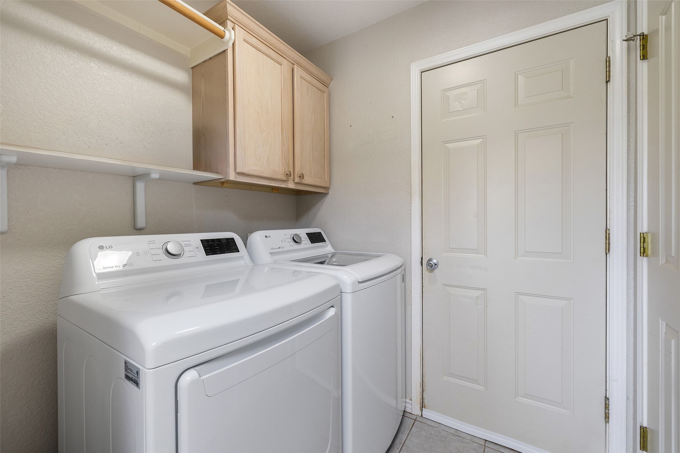 135 Barton Road San Marcos, TX 78666 - Photo 15 of 29 Laundry room with plenty of storage
