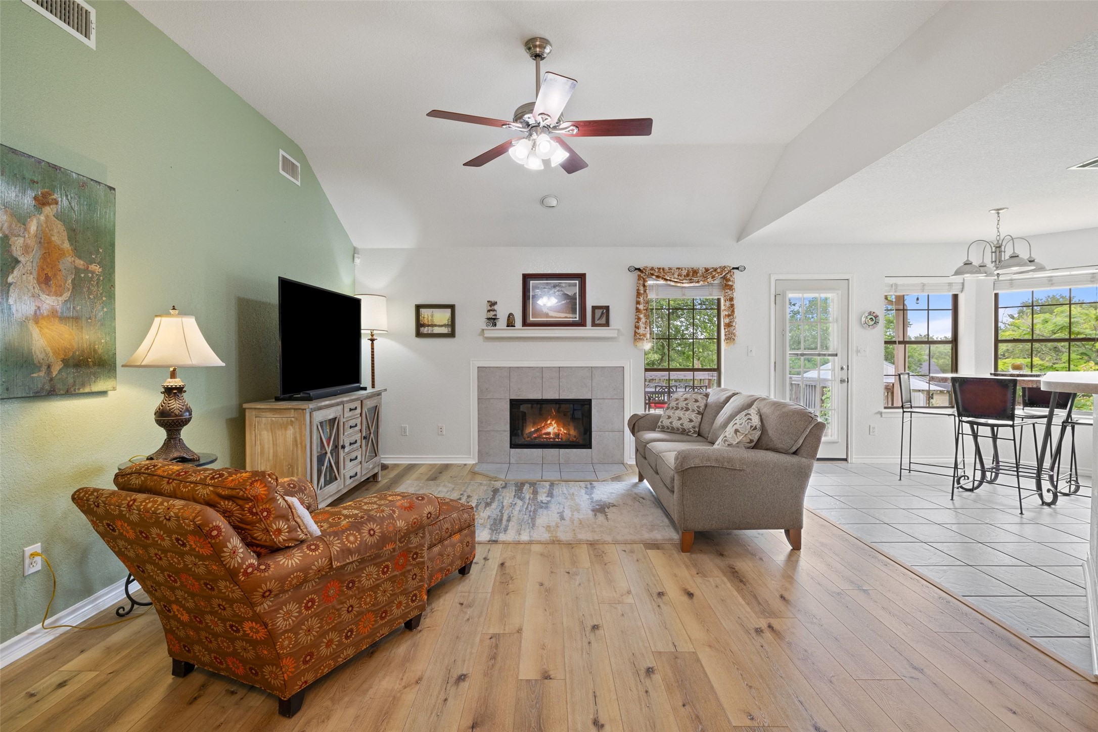 135 Barton Road San Marcos, TX 78666 - Photo 2 of 29 Living room with a cozy fireplace