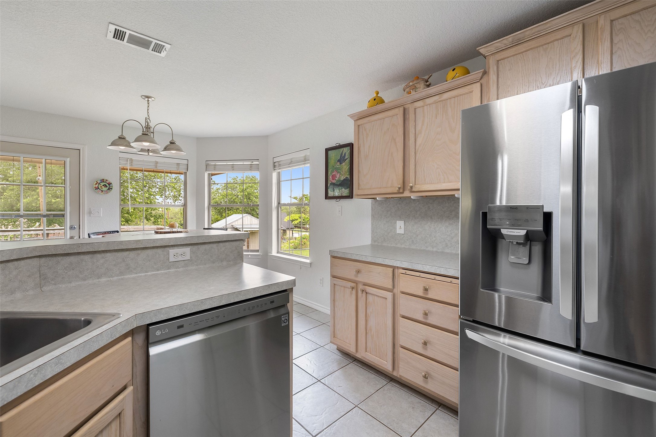135 Barton Road San Marcos, TX 78666 - Photo 21 of 29 Stainless steel kitchen appliances with spacious kitchen storage