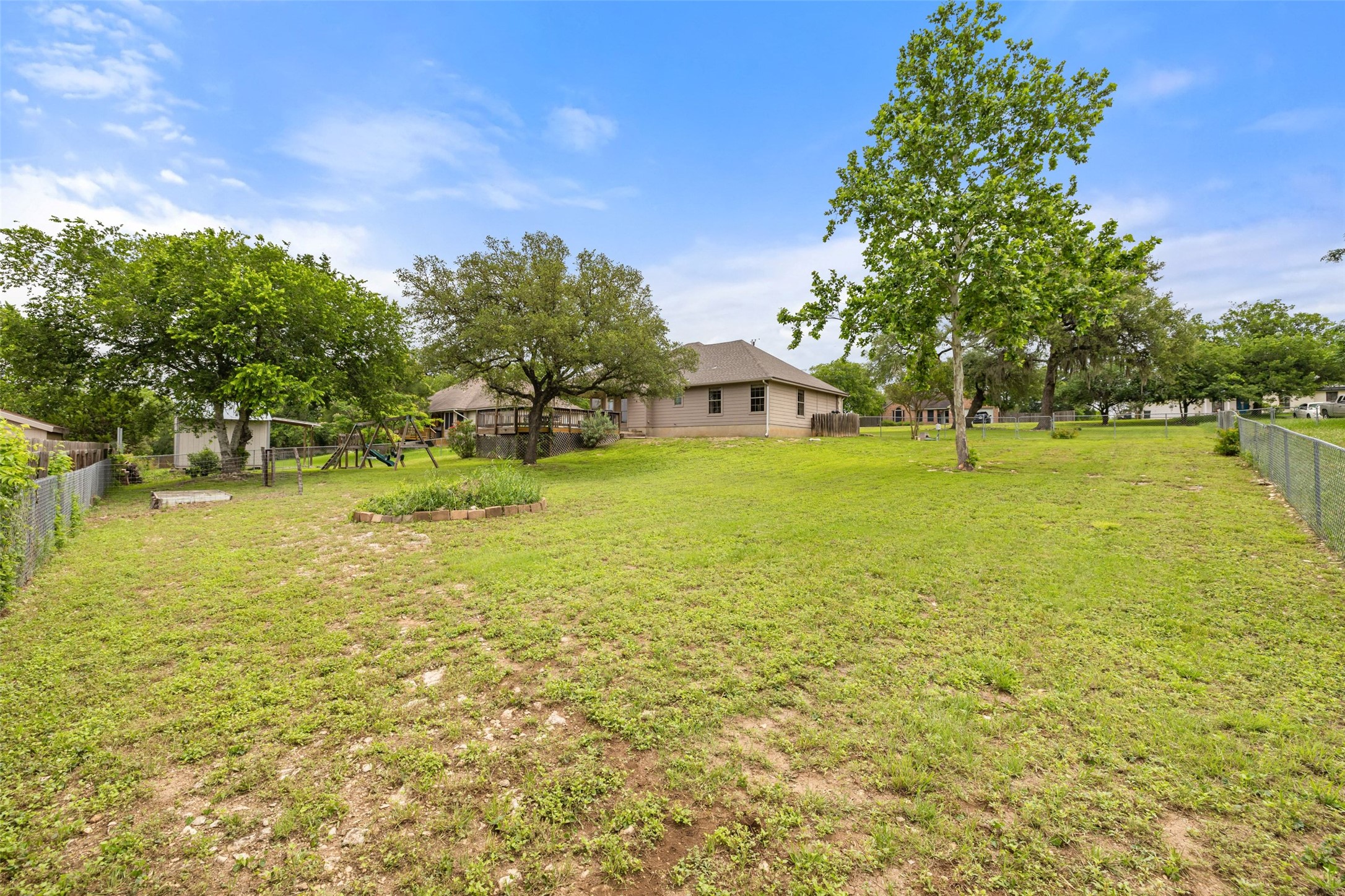 135 Barton Road San Marcos, TX 78666 - Photo 9 of 29 Spacious landscape backyard