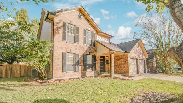 a view of a house with snow on the wall
