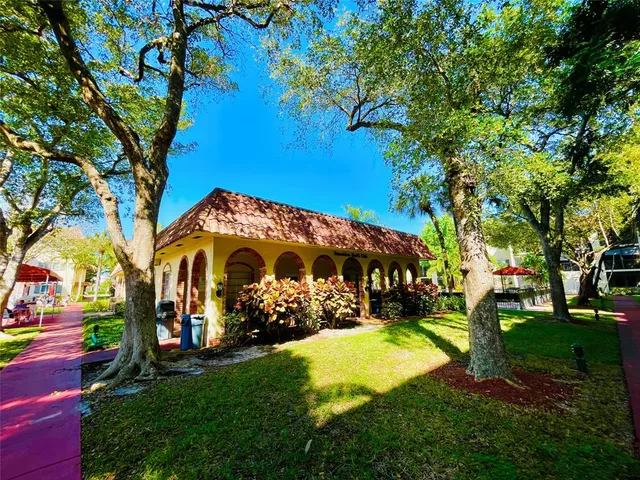 a bathroom with a sink a toilet and bathtub