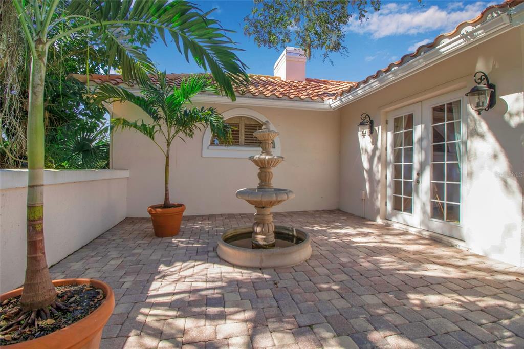 401 Walls Way Osprey, FL 34229 - Photo 15 of 51 a vase of flowers sitting on a table