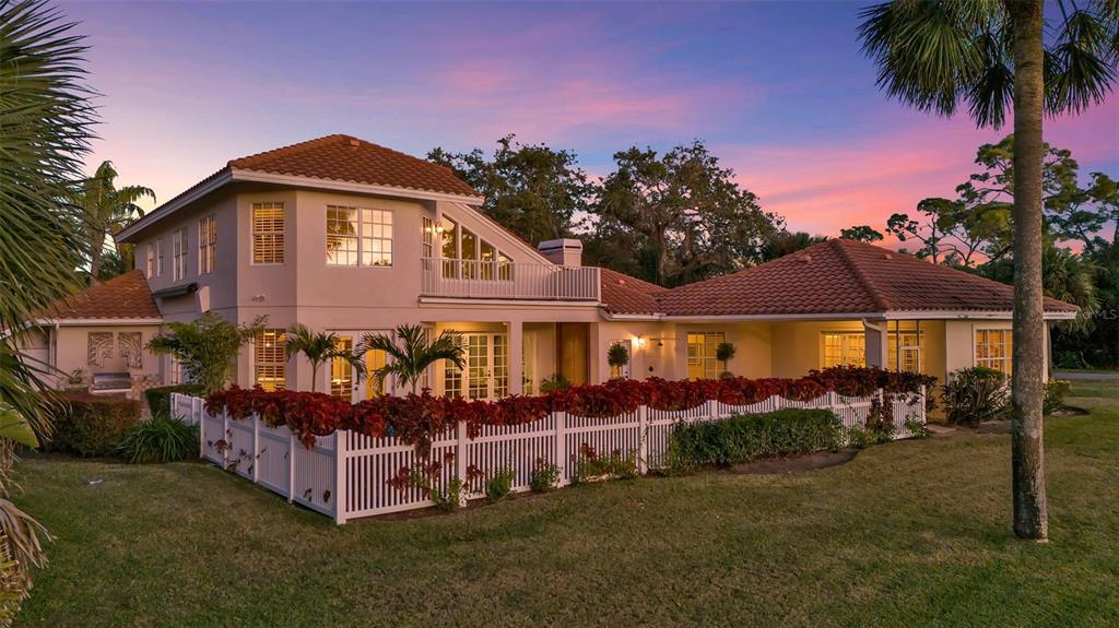 401 Walls Way Osprey, FL 34229 - Photo 2 of 51 a front view of a house with a yard