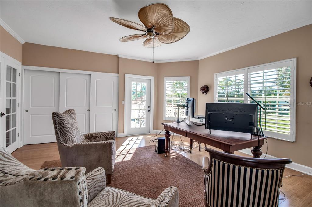 401 Walls Way Osprey, FL 34229 - Photo 24 of 51 a living room with furniture and a window