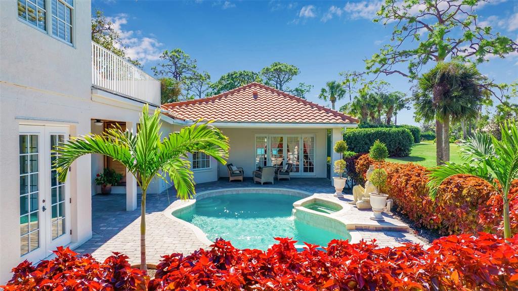 401 Walls Way Osprey, FL 34229 - Photo 29 of 51 a view of a house with patio outdoor seating area