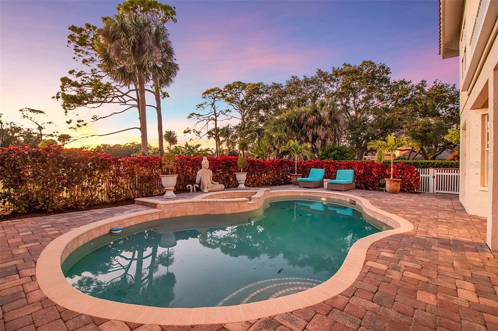 401 Walls Way Osprey, FL 34229 - Photo 30 of 51 a view of a swimming pool with a yard