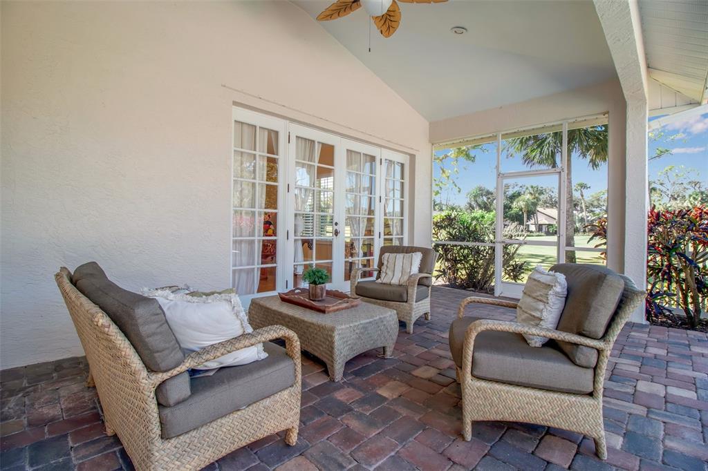 401 Walls Way Osprey, FL 34229 - Photo 32 of 51 a living room with furniture and a potted plant