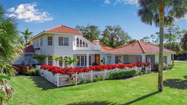 an aerial view of a town with couple of houses