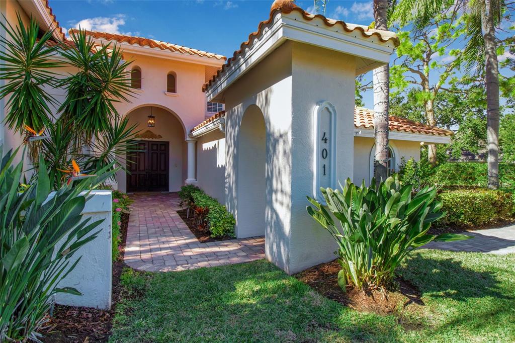 401 Walls Way Osprey, FL 34229 - Photo 39 of 51 a front view of a house with a yard