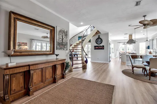 a view of a living room and dining room