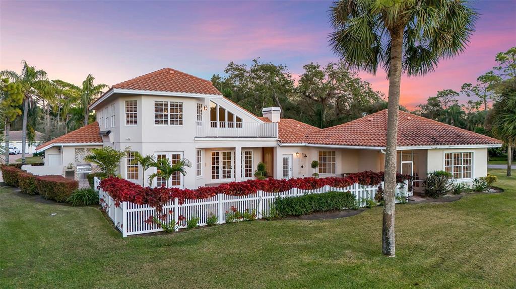 401 Walls Way Osprey, FL 34229 - Photo 44 of 51 a front view of a house with garden