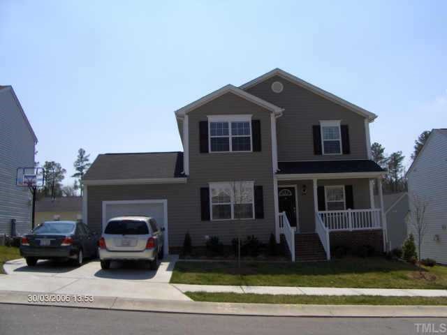 606 Hanson Road Durham, NC 27713 - Photo 1 of 1 a front view of a house with a yard