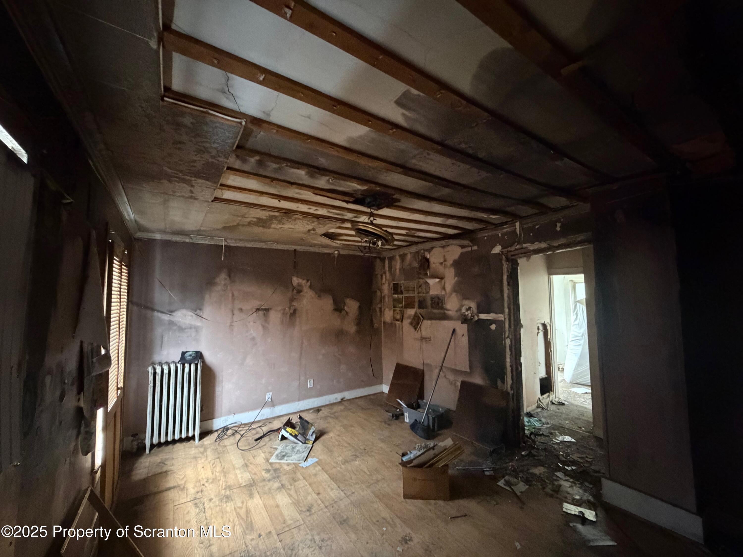 60 Mill Street Pittston, PA 18640 - Photo 20 of 33 a view of a room with wooden floor