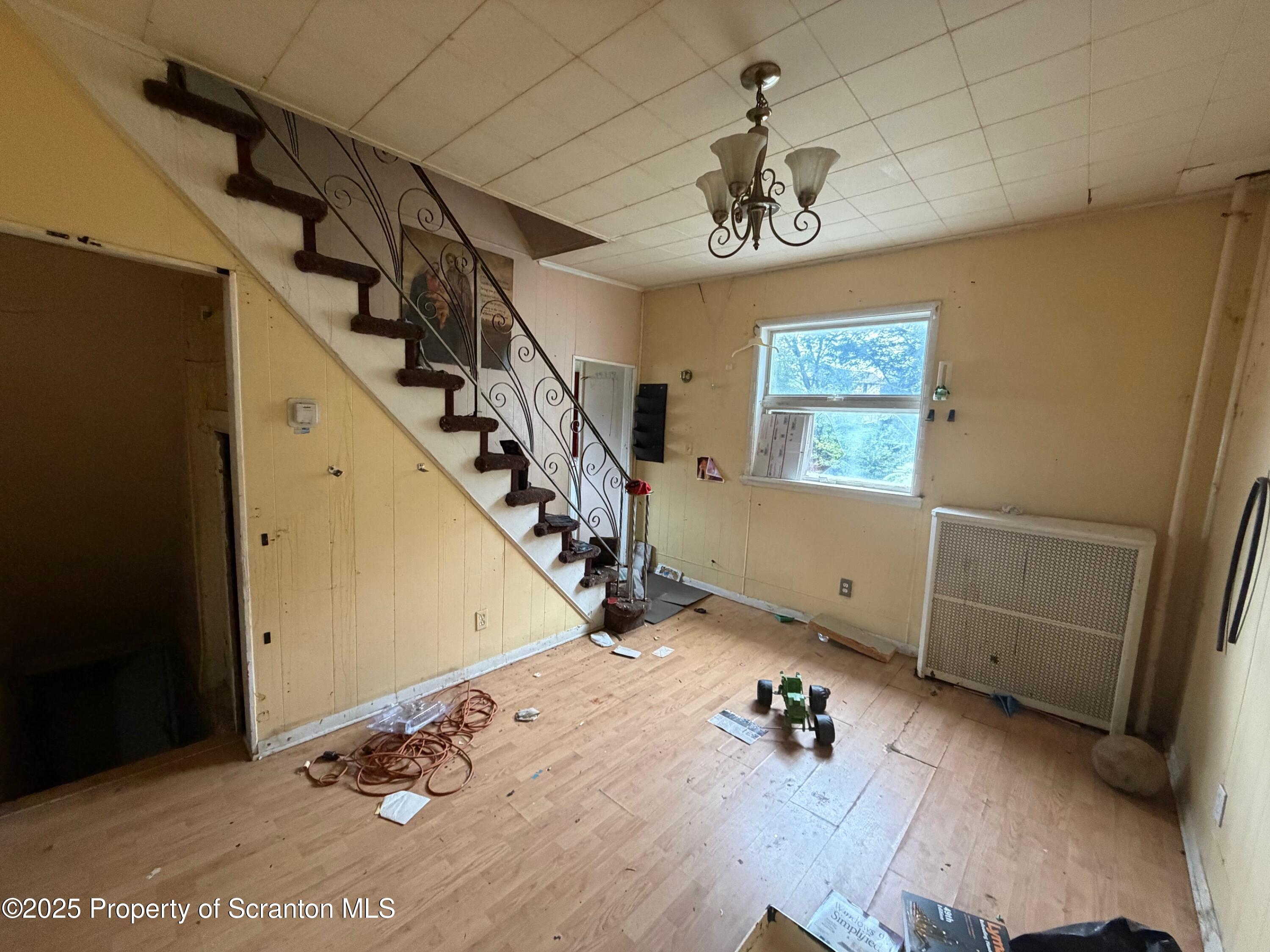 60 Mill Street Pittston, PA 18640 - Photo 30 of 33 a view of livingroom with furniture and stairs