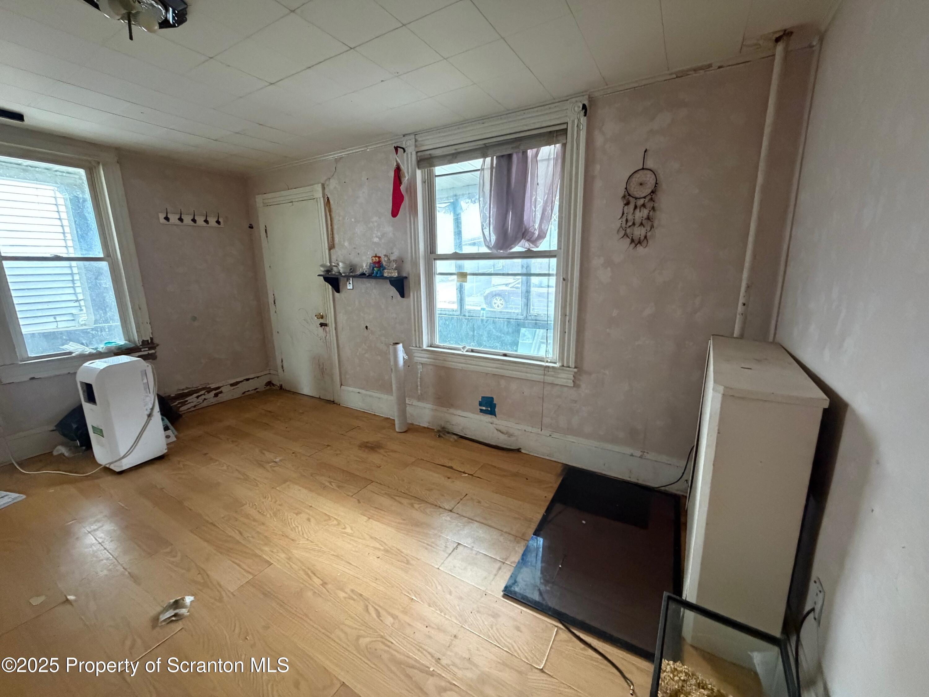 60 Mill Street Pittston, PA 18640 - Photo 32 of 33 a view of an empty room and window