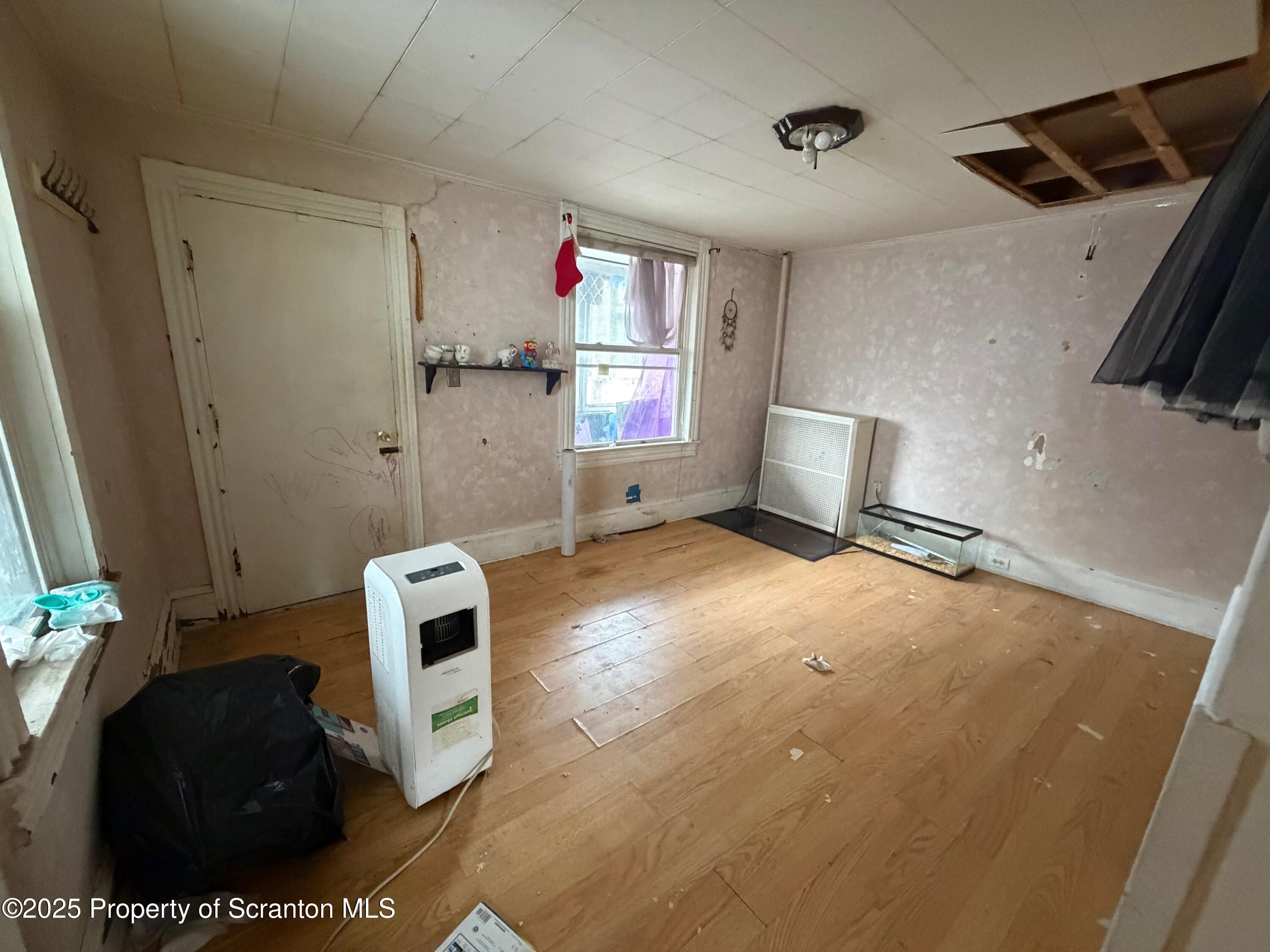 60 Mill Street Pittston, PA 18640 - Photo 33 of 33 a workspace with furniture and window