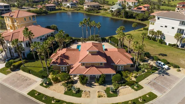 an aerial view of a house with outdoor space