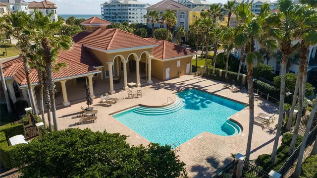 a view of swimming pool with a yard